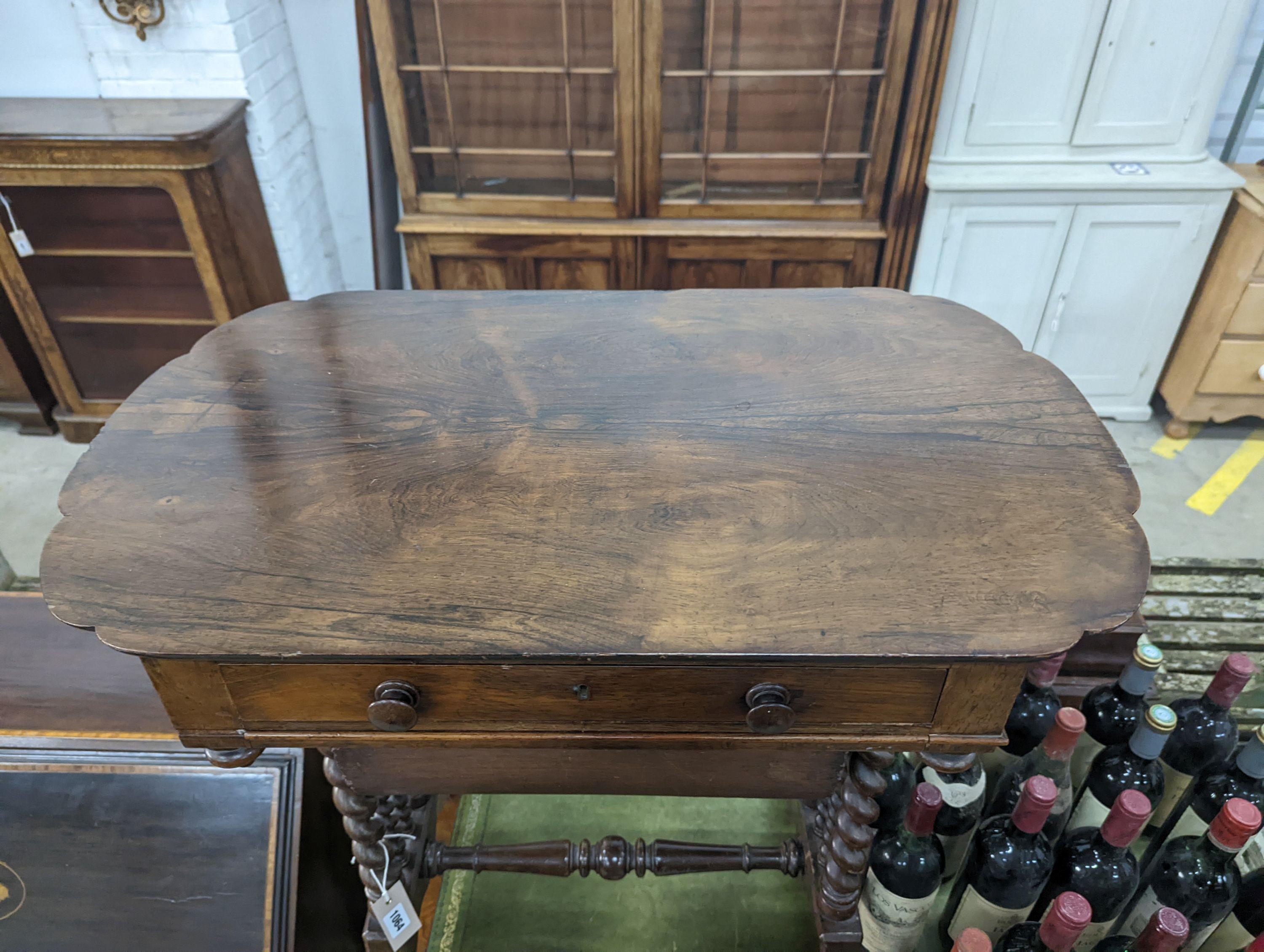 A 19th century Continental rosewood work table on spiral turned supports width 73cm, depth 45cm, height 71cm